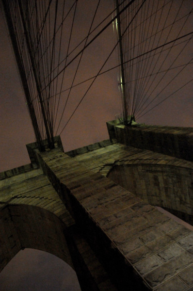 Ben Asen Personal Work Photo: Color photo of Brooklyn Bridge arch and cables at night in Brooklyn New York