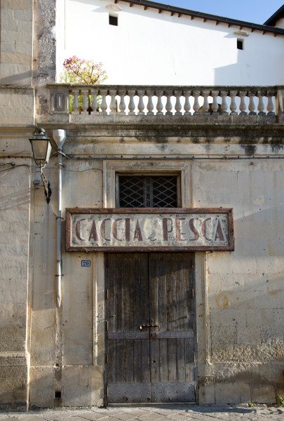 Ben Asen Personal Work Photo: Color photo of a restaurant named Caccia e Pesce in Galantina, in the Puglia region of Italy.