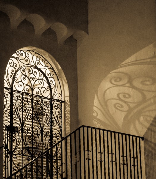 Ben Asen Personal Work Photo: black and white sepia toned photo of shadow and light in doorway in San Francisco California