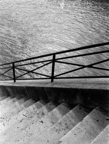 Ben Asen Personal Work Photo: black and white photo of steps leading down to the Seine river in Paris France.