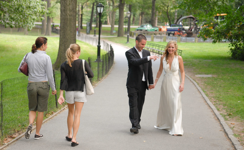Ben Asen Celebration Photo: Bride and groom strolling through Central Park New York City